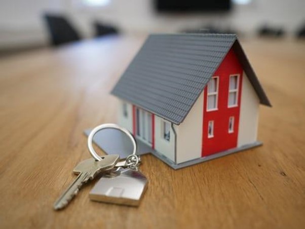 Property insurance - A house and a key.